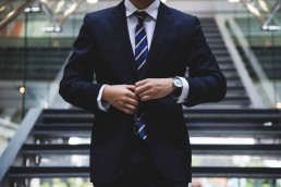 a man in a suit and tie