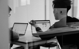 Accountants in office using laptop